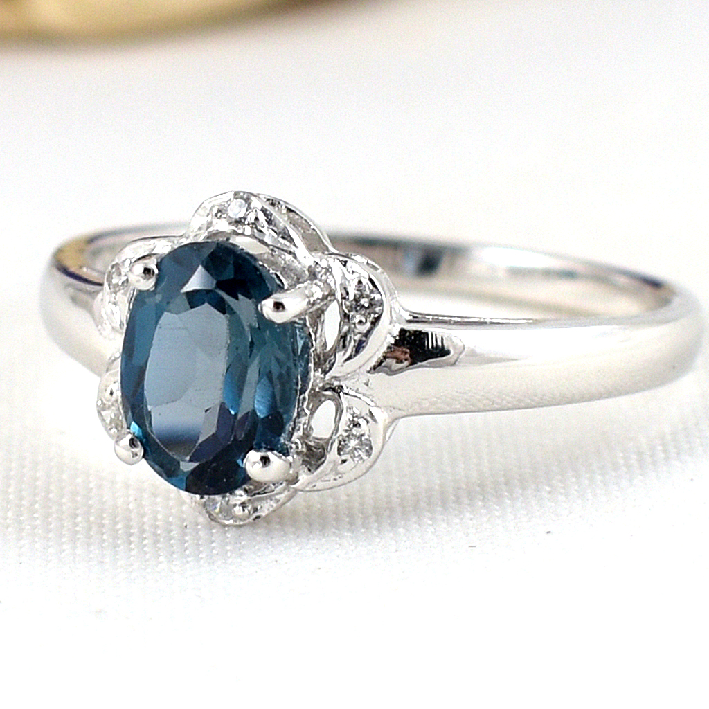 แหวนเงินแท้ราคาถูกชุบทองคำขาว ลอนดอนบลูโทปาซแท้ 0.95 กะรัต เพชรCZ 0.06 กะรัต งานประณีตสวยงาม สั่งผลิตค่ะ