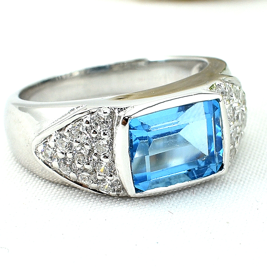 แหวนเงินแท้ราคาถูกชุบทองคำขาว สวิสบลูโทปาซแท้ 2.80 กะรัต เพชรCZ 0.50 กะรัต งานประณีตสวยงาม สั่งผลิตค่ะ