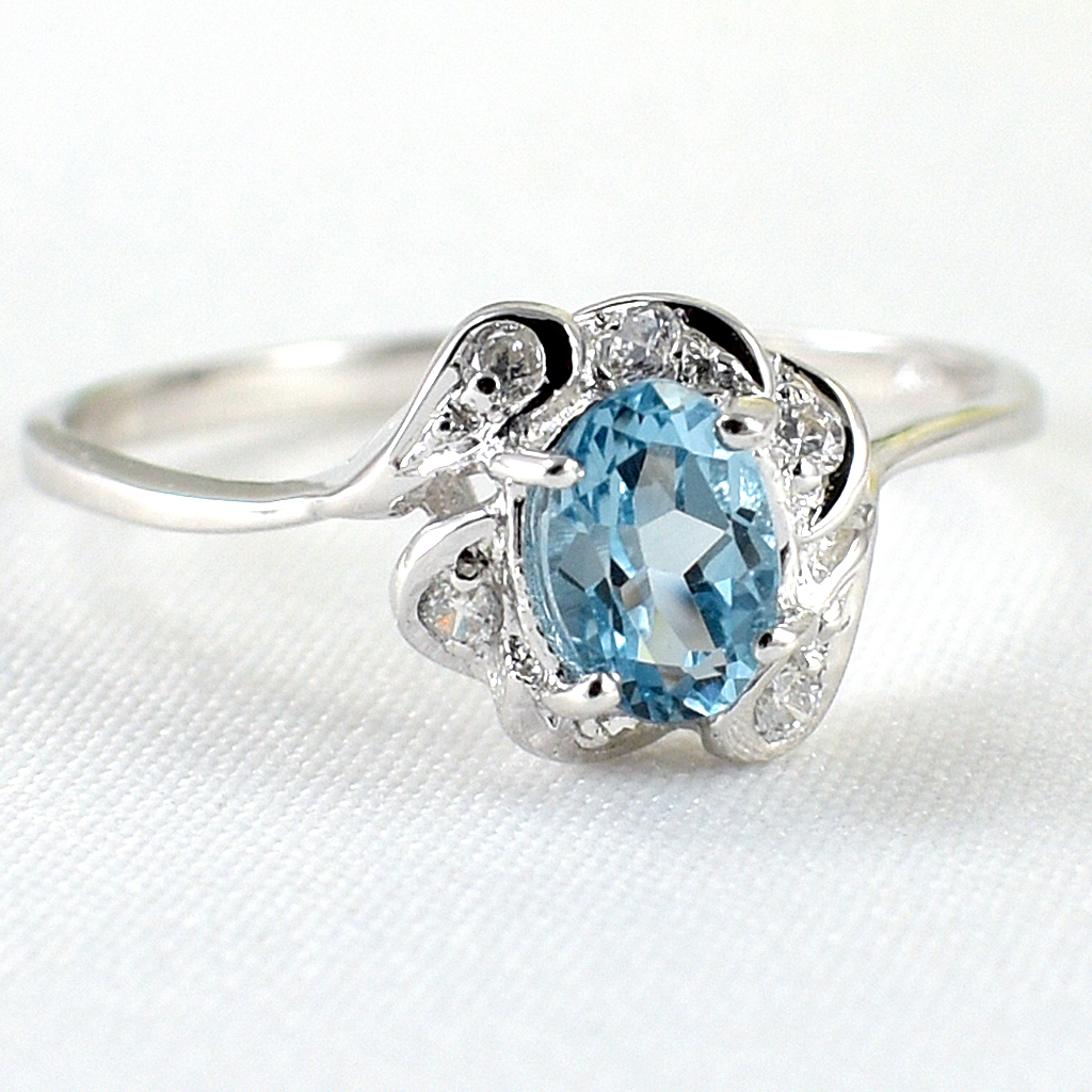 แหวนเงินแท้ราคาถูกชุบทองคำขาว สวิสบลูโทปาซแท้ 0.65 กะรัต เพชรCZ 0.09 กะรัต งานประณีตสวยงาม สั่งผลิตค่ะ