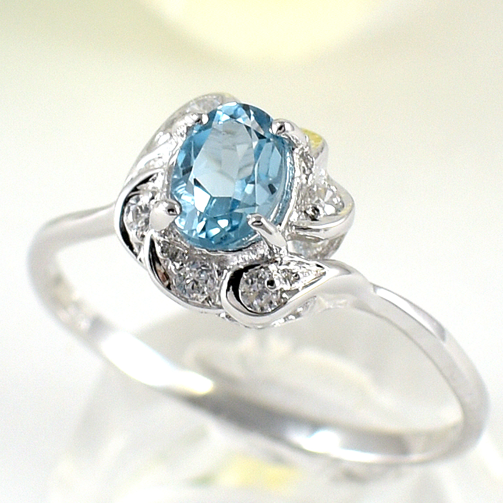 แหวนเงินแท้ราคาถูกชุบทองคำขาว สวิสบลูโทปาซแท้ 0.65 กะรัต เพชรCZ 0.09 กะรัต งานประณีตสวยงาม สั่งผลิตค่ะ