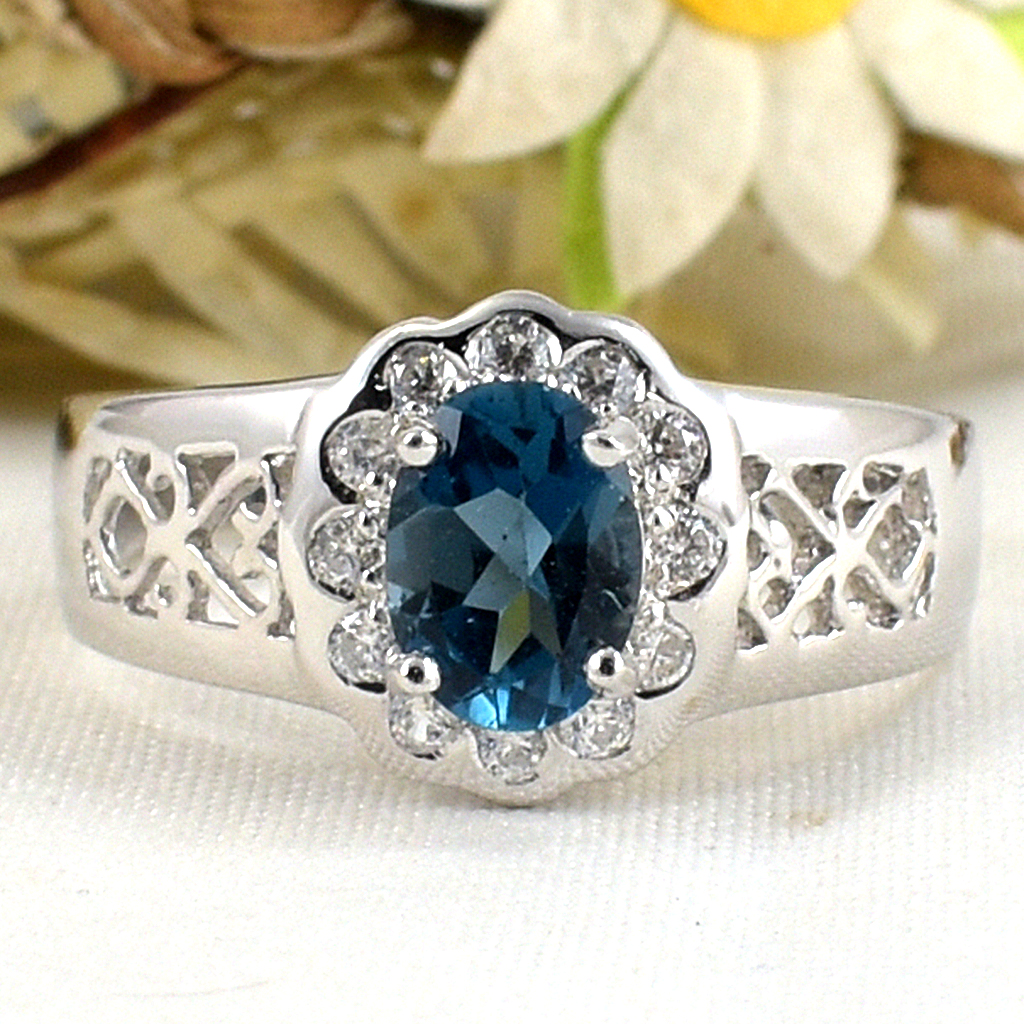 แหวนเงินแท้ราคาถูกชุบทองคำขาว ลอนดอนบลูโทปาซแท้ 0.95 กะรัต เพชรCZ 0.18 กะรัต งานประณีตสวยงาม สั่งผลิตค่ะ