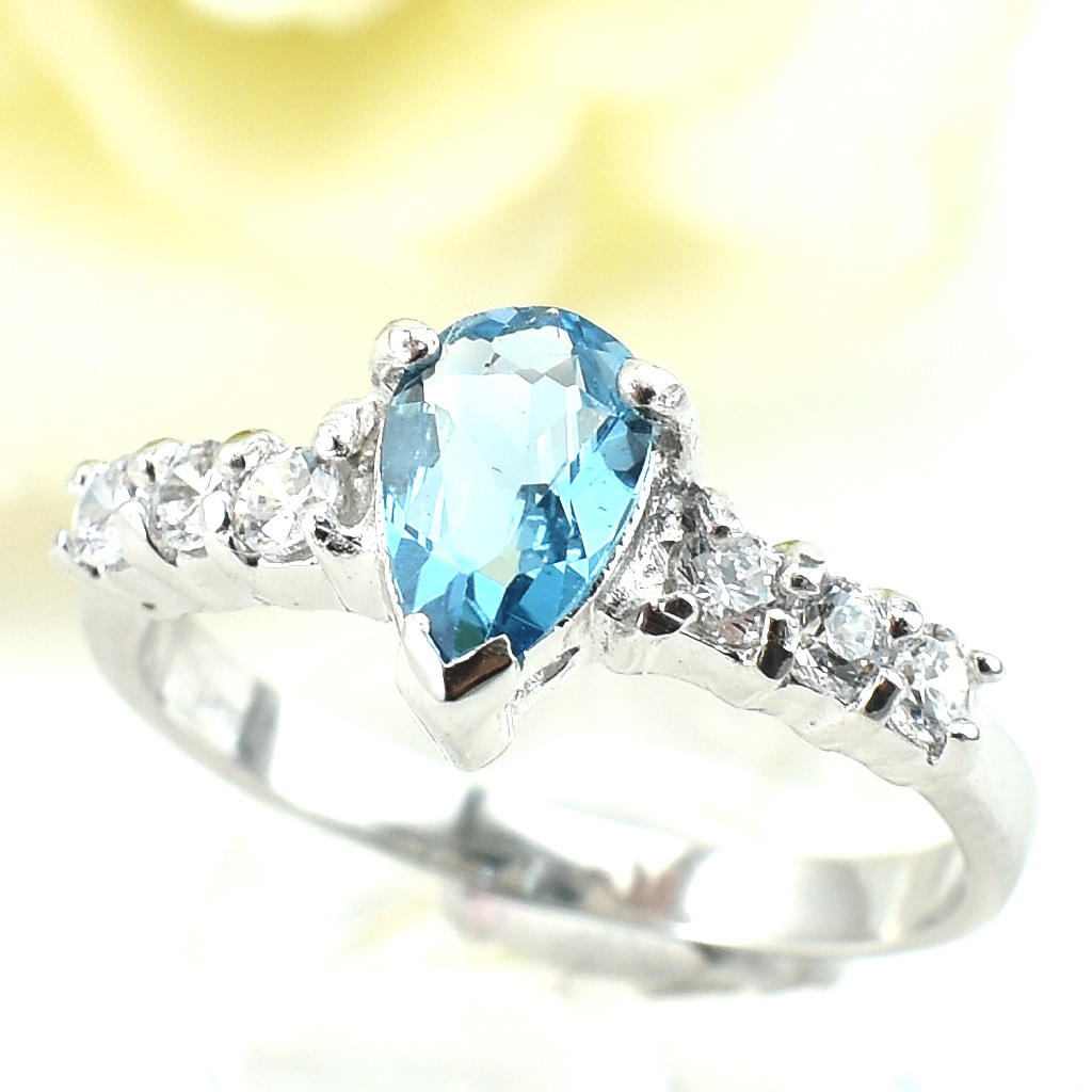 แหวนเงินแท้ราคาถูกชุบทองคำขาว สวิสบลูโทปาซแท้ 1.35 กะรัต เพชรCZ 0.30 กะรัต งานประณีตสวยงาม สั่งผลิตค่ะ