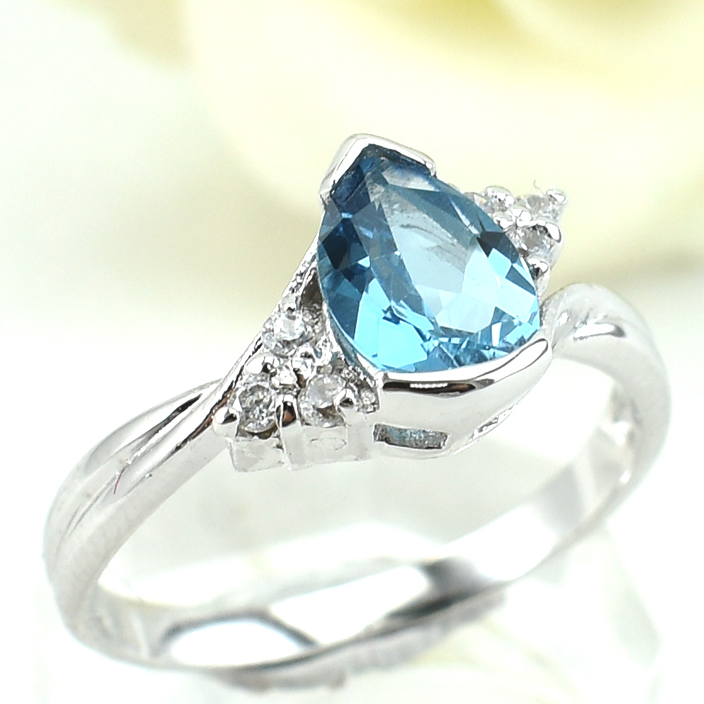 แหวนเงินแท้ราคาถูกชุบทองคำขาว สวิสบลูโทปาซแท้ 1.35 กะรัต เพชรCZ 0.06 กะรัต งานประณีตสวยงาม สั่งผลิตค่ะ