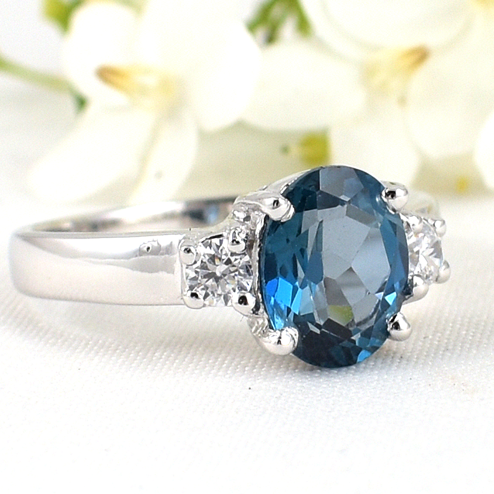 แหวนเงินแท้ราคาถูกชุบทองคำขาว ลอนดอนบลูโทปาซแท้ 2.35 กะรัต เพชรCZ 0.20 กะรัต งานประณีตสวยงาม สั่งผลิตค่ะ