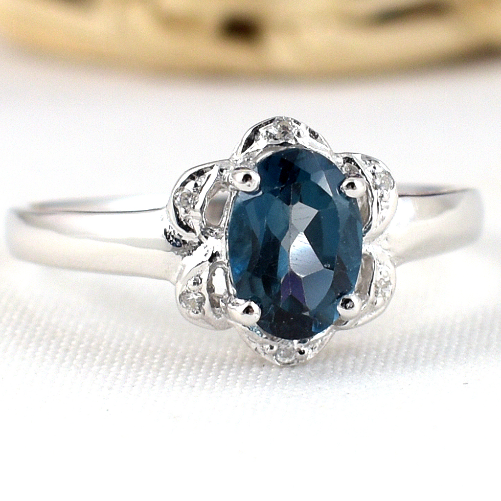 แหวนเงินแท้ราคาถูกชุบทองคำขาว ลอนดอนบลูโทปาซแท้ 0.95 กะรัต เพชรCZ 0.06 กะรัต งานประณีตสวยงาม สั่งผลิตค่ะ