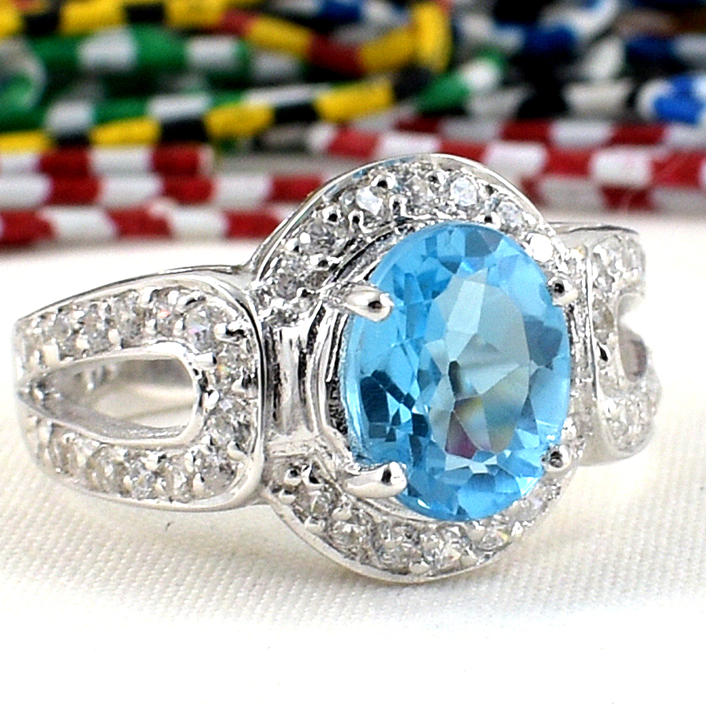 แหวนเงินแท้ราคาถูกชุบทองคำขาว สวิสบลูโทปาซแท้ 2.25 กะรัต เพชรCZ 0.69 กะรัต งานประณีตสวยงาม สั่งผลิตค่ะ