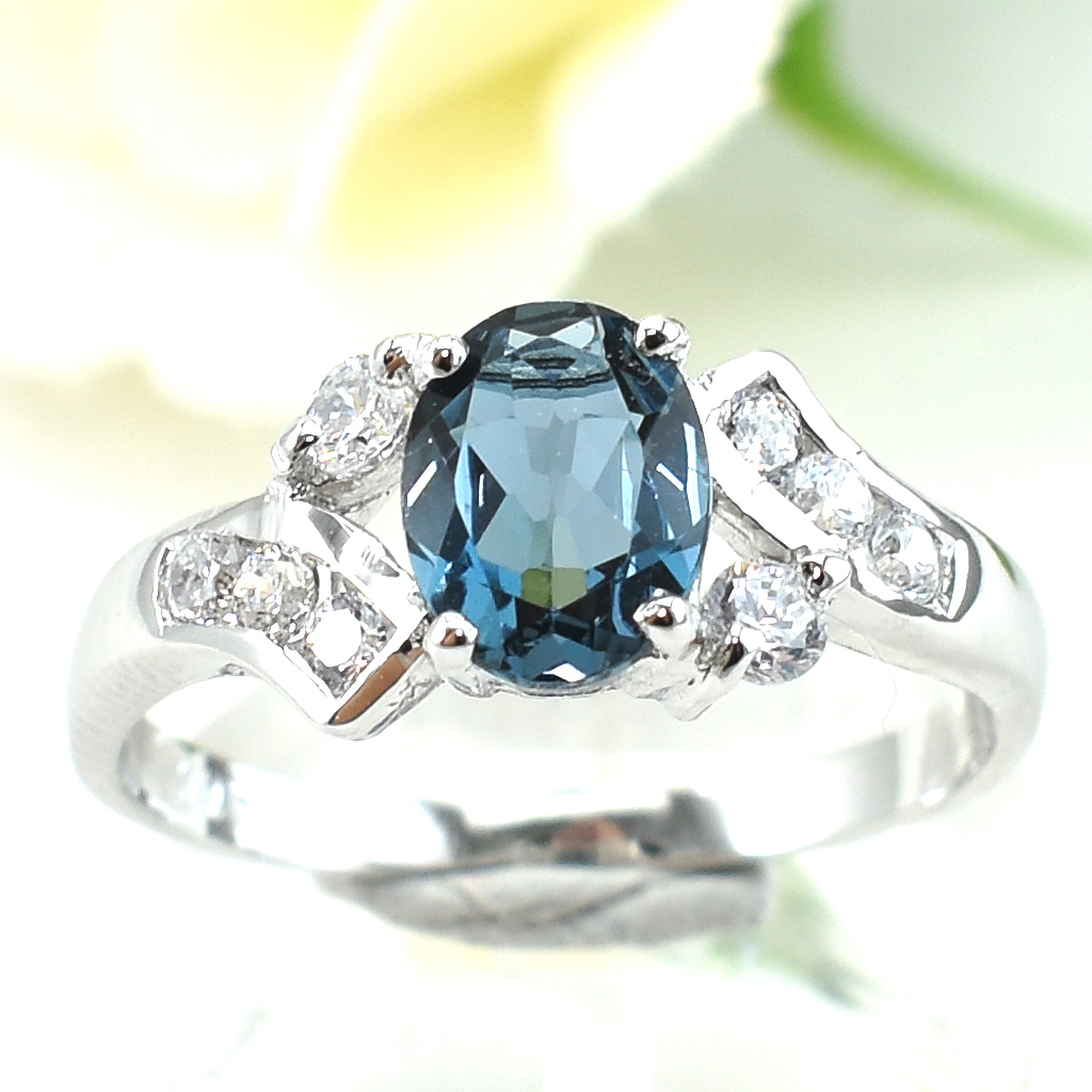 แหวนเงินแท้ราคาถูกชุบทองคำขาว ลอนดอนบลูโทปาซแท้ 1.65 กะรัต เพชรCZ 0.21 กะรัต งานประณีตสวยงาม สั่งผลิตค่ะ