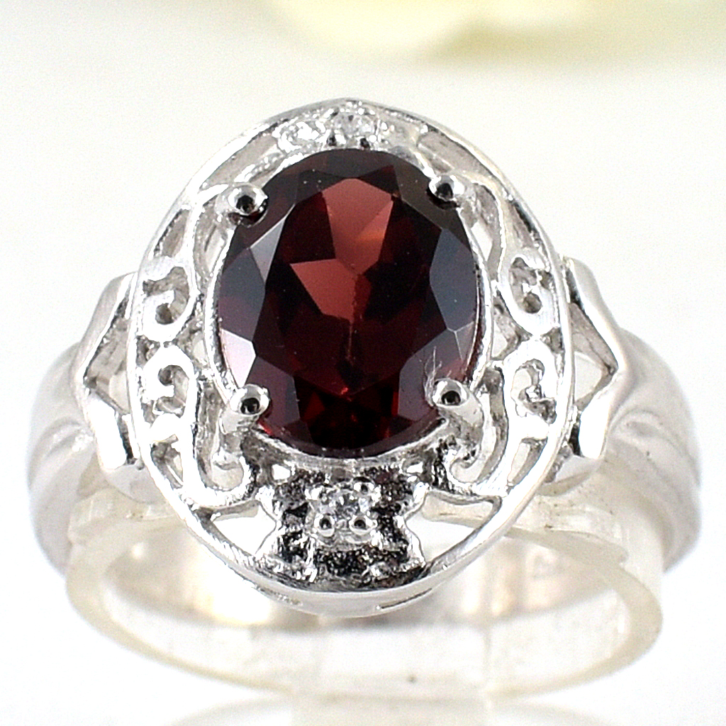 แหวนเงินแท้ราคาถูกชุบทองคำขาว พลอยแท้โกเมน 2.25 กะรัต เพชรCZ 0.02 กะรัต งานประณีตสวยงาม สั่งผลิตค่ะ