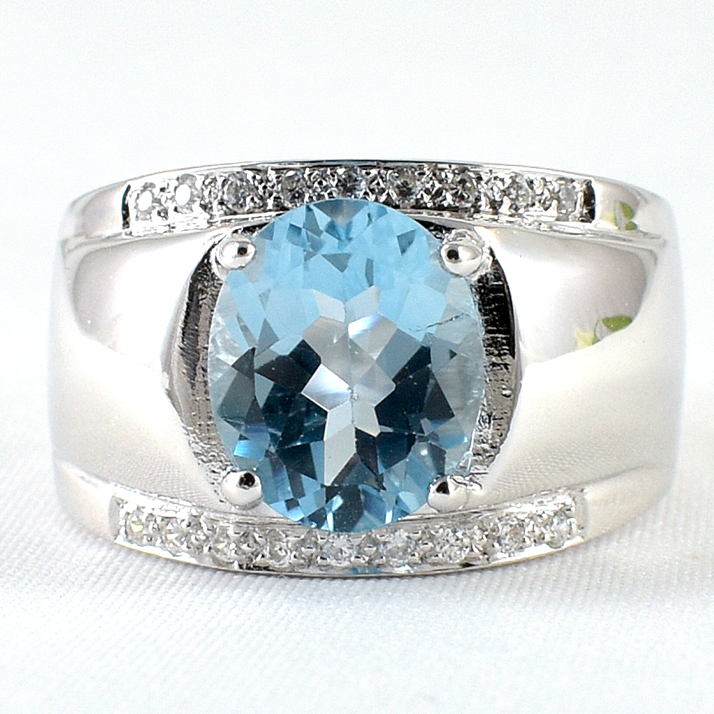 แหวนเงินแท้ราคาถูกชุบทองคำขาว สกายบลูโทปาซแท้ 4.50 กะรัต เพชรCZ 0.18 กะรัต งานประณีตสวยงาม สั่งผลิตค่ะ