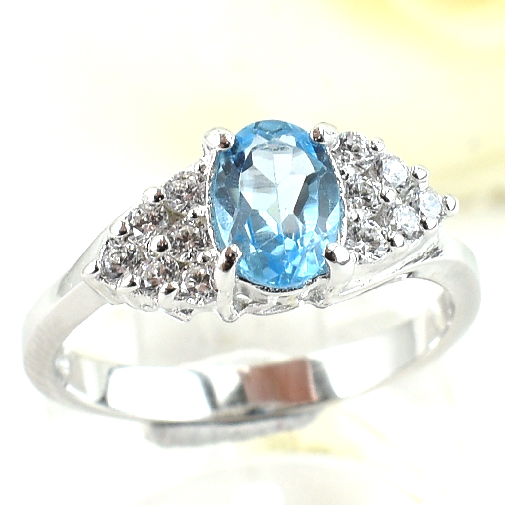 แหวนเงินแท้ราคาถูกชุบทองคำขาว สวิสบลูโทปาซแท้ 1.05 กะรัต เพชรCZ 0.36 กะรัต งานประณีตสวยงาม สั่งผลิตค่ะ