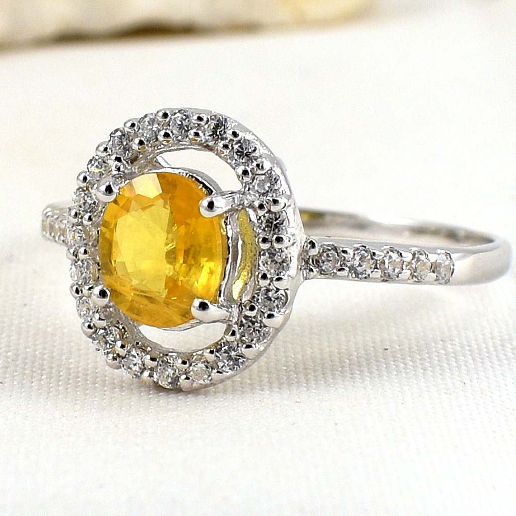 แหวนเงินแท้ราคาถูกชุบทองคำขาว บุษราคัมแท้ 0.95 กะรัต เพชรCZ 0.30 กะรัต งานประณีตสวยงาม สั่งผลิตค่ะ