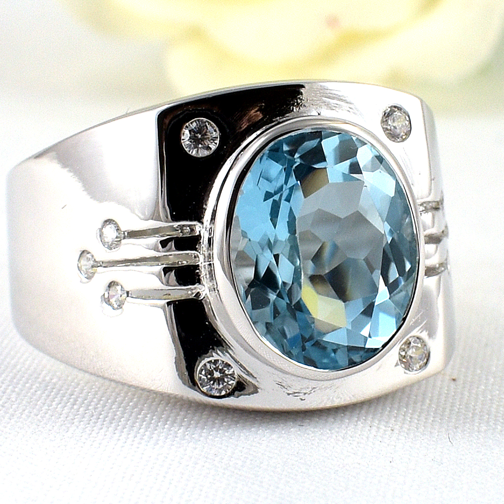 แหวนเงินแท้ราคาถูกชุบทองคำขาว สกายบลูโทปาซแท้ 6.0 กะรัต เพชรCZ 0.19 กะรัต งานประณีตสวยงาม สั่งผลิตค่ะ