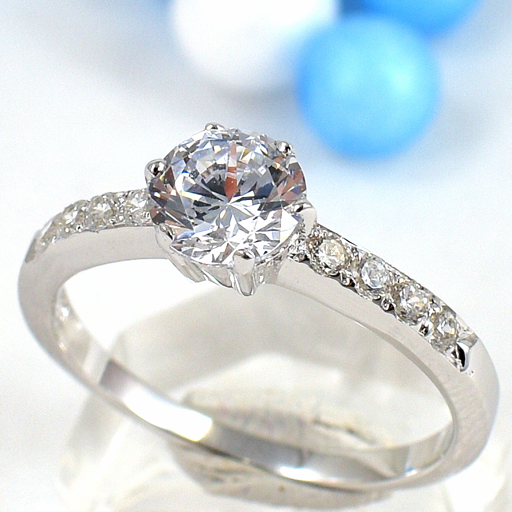 แหวนเงินแท้ราคาถูกชุบทองคำขาว เพชรCZเม็ดกลาง 0.80 กะรัต เพชรCZเม็ดข้าง 0.15 กะรัต งานประณีตสวยงาม สั่งผลิตค่ะ