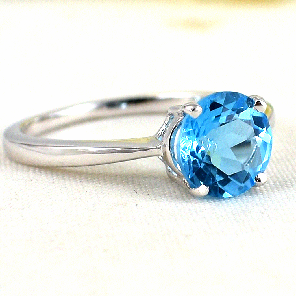 แหวนเงินแท้ราคาถูกชุบทองคำขาว สวิสบลูโทปาซแท้ 1.65 กะรัต งานประณีตสวยงาม สั่งผลิตค่ะ