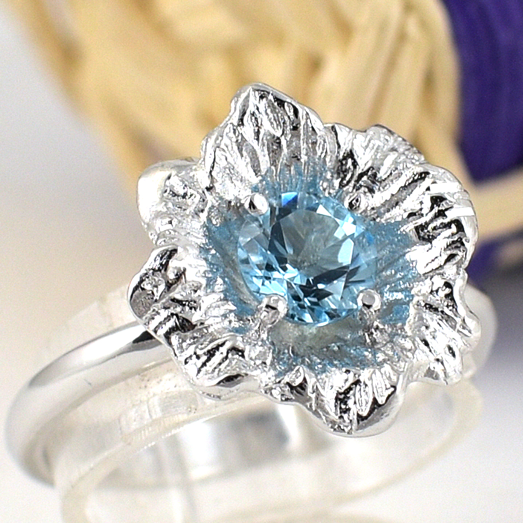 แหวนเงินแท้ราคาถูกชุบทองคำขาว สวิสบลูโทปาซแท้ 0.60 กะรัต งานประณีตสวยงาม สั่งผลิตค่ะ