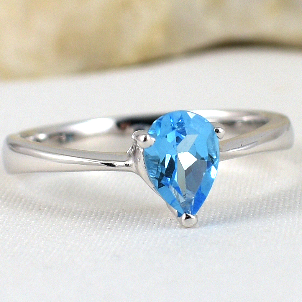 แหวนเงินแท้ราคาถูกชุบทองคำขาว สวิสบลูโทปาซแท้ 0.80 กะรัต งานประณีตสวยงาม สั่งผลิตค่ะ