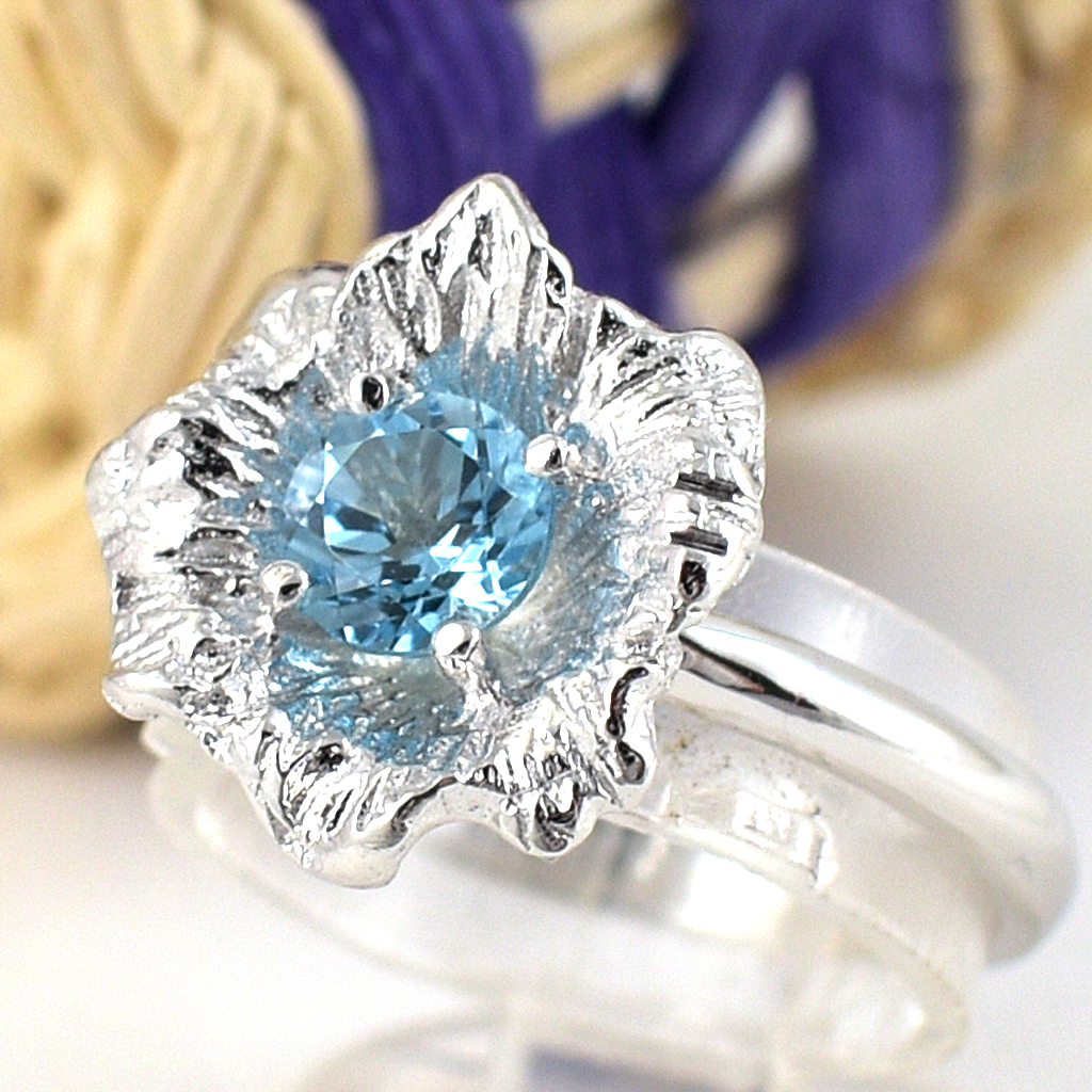 แหวนเงินแท้ราคาถูกชุบทองคำขาว สวิสบลูโทปาซแท้ 0.60 กะรัต งานประณีตสวยงาม สั่งผลิตค่ะ