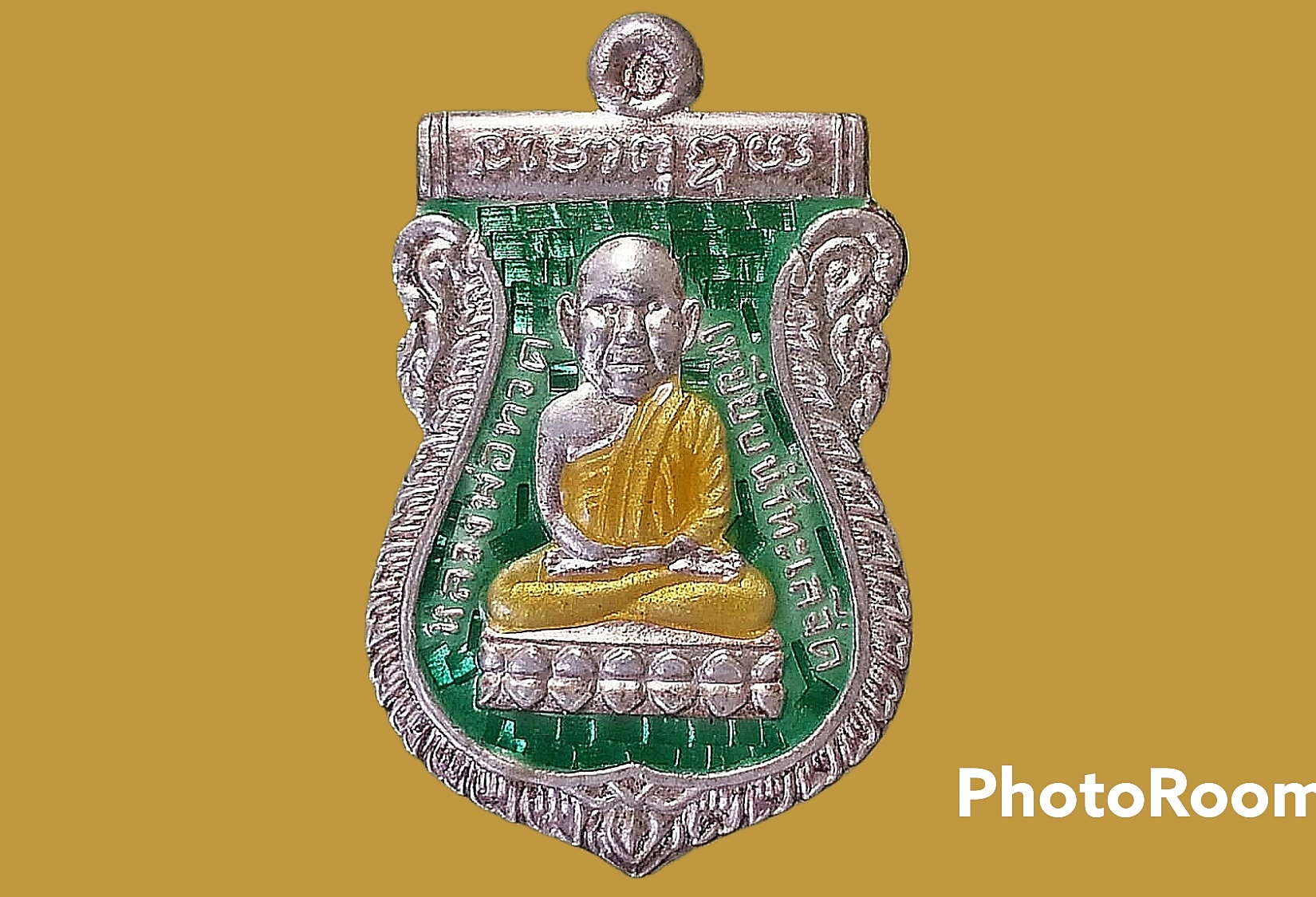 เหรียญเสมา หัวโต หลวงปู่ทวด พระครูอนุศาสน์กิจจาทร (เขียว) วัดห้วยเงาะ จ.ปัตตานี รุ่นมงคล 80 ปี 2552 เนื้อเงินลงยาสีเขียว จำนวนสร้าง 999 เหรียญ หมายเลข 303 ตอกโค๊ด "ฮก"