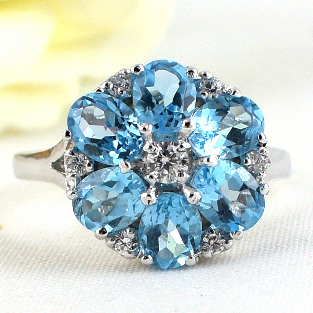 แหวนเงินแท้ราคาถูกชุบทองคำขาว สวิสบลูโทปาซแท้ 2.04 กะรัต เพชรCZ 0.41 กะรัต งานประณีตสวยงาม สั่งผลิตค่ะ