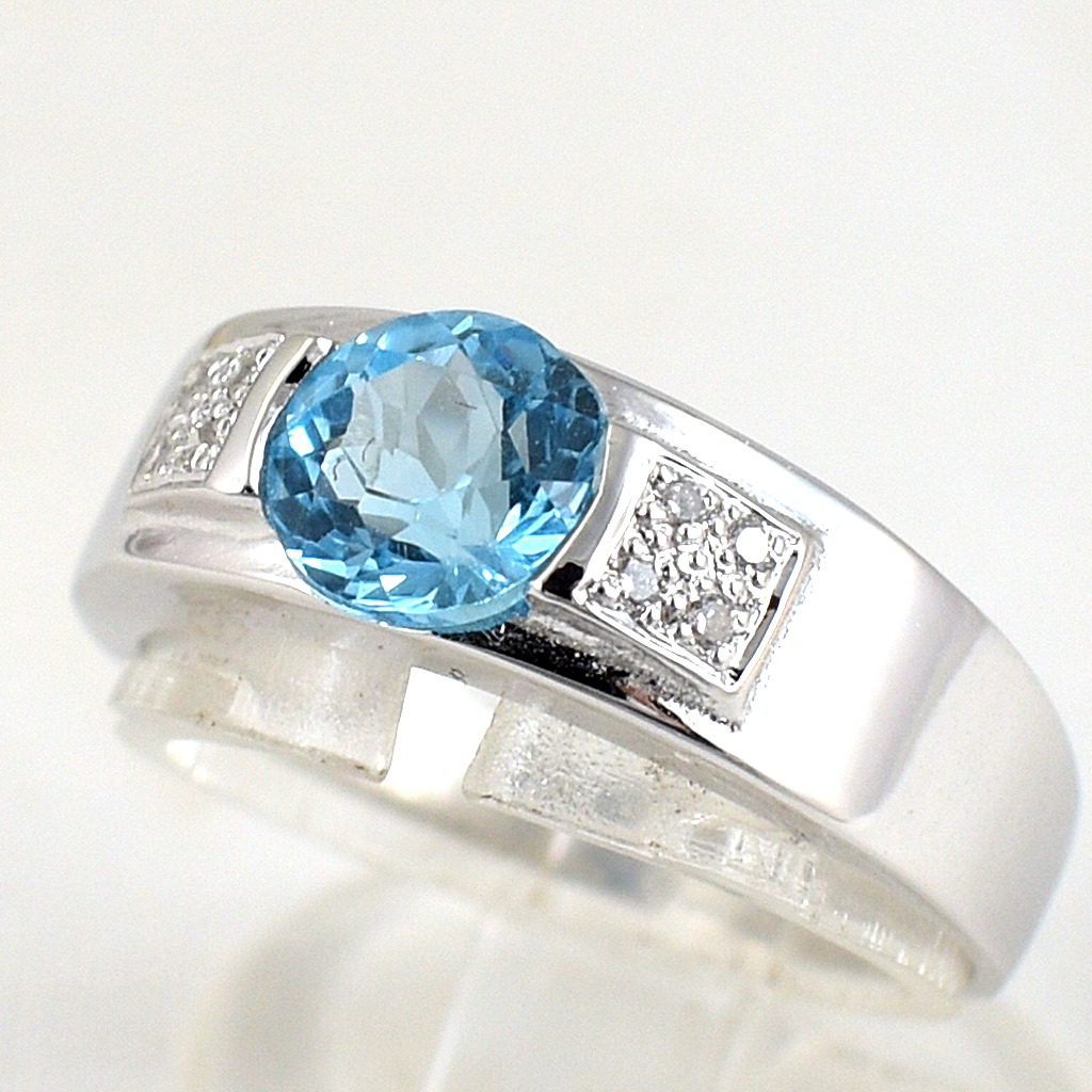 แหวนเงินแท้ราคาถูกชุบทองคำขาว สวิสบลูโทปาซแท้ 1.0 กะรัต เพชรCZ 0.056 กะรัต งานประณีตสวยงาม สั่งผลิตค่ะ