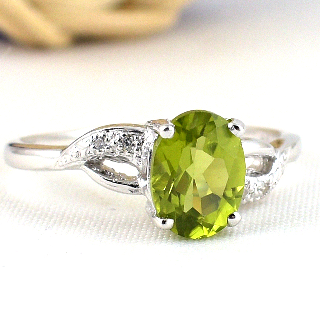 แหวนเงินแท้ราคาถูกชุบทองคำขาว เพอริดอทแท้ 1.60 กะรัต เพชรCZ 0.028 กะรัต งานประณีตสวยงาม สั่งผลิตค่ะ