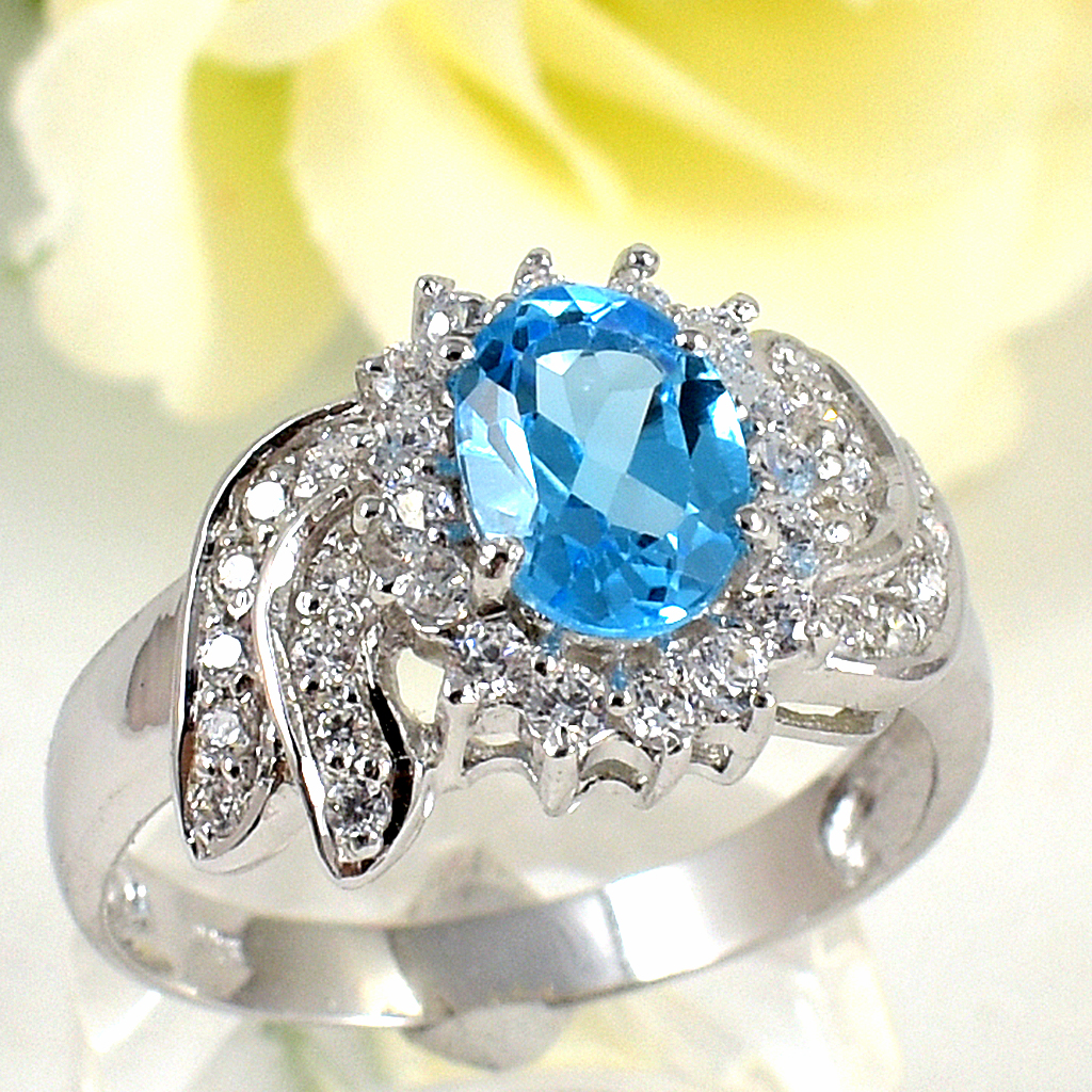 แหวนเงินแท้ราคาถูกชุบทองคำขาว สวิสบลูโทปาซแท้ 1.85 กะรัต เพชรCZ 0.44 กะรัต งานประณีตสวยงาม สั่งผลิตค่ะ