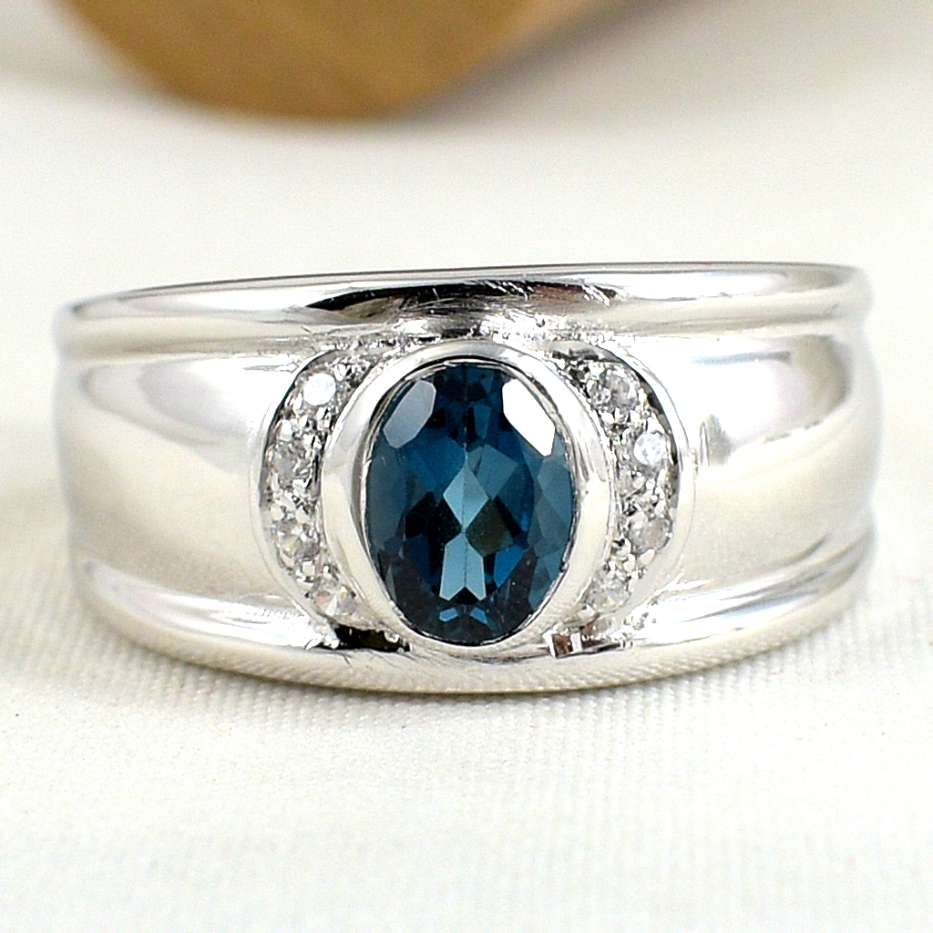 แหวนเงินแท้ราคาถูกชุบทองคำขาว ลอนดอนบลูโทปาซแท้ 0.95 กะรัต เพชรCZ 0.08 กะรัต งานประณีตสวยงาม สั่งผลิตค่ะ