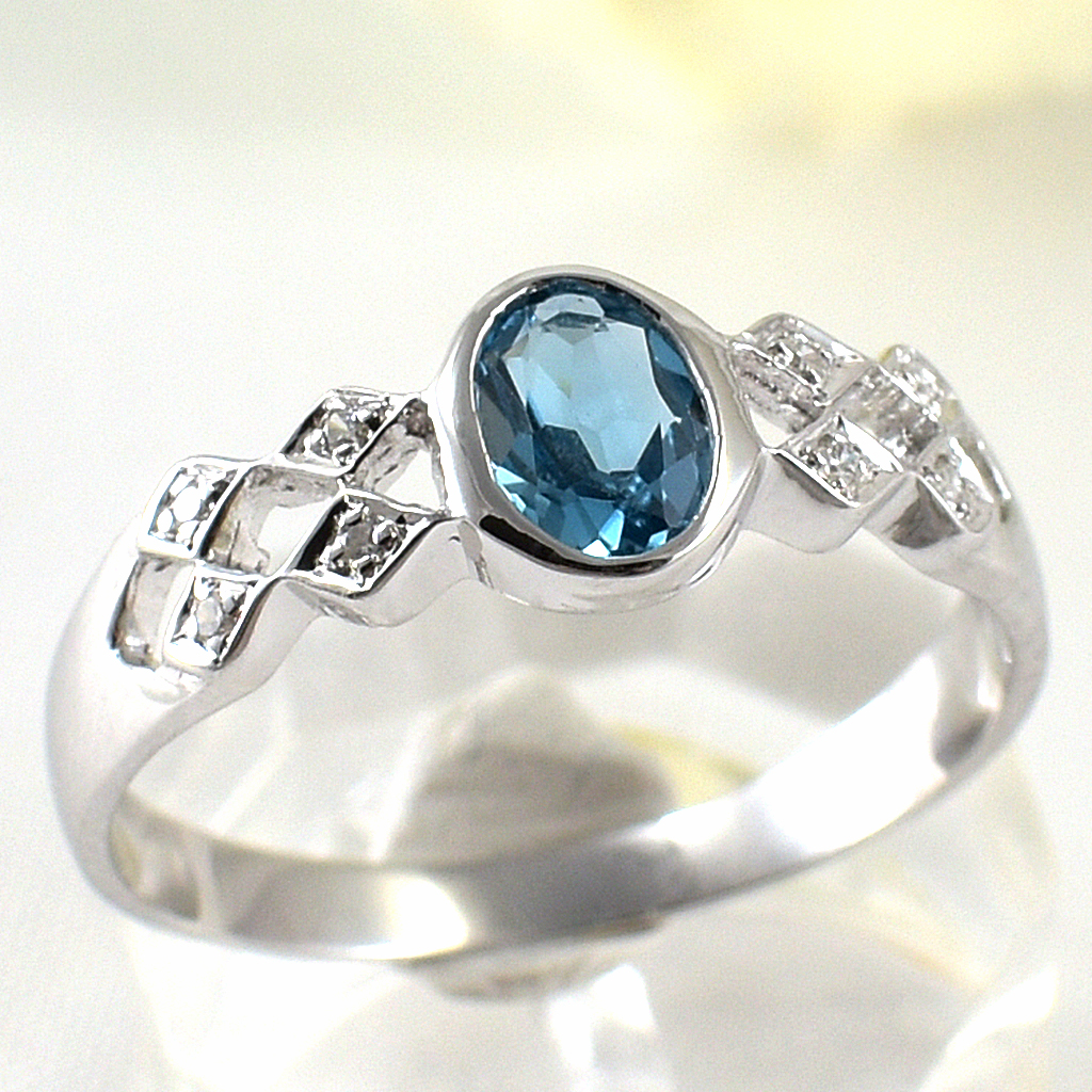 แหวนเงินแท้ราคาถูกชุบทองคำขาว ลอนดอนบลูโทปาซแท้ 0.55 กะรัต เพชรCZ 0.056 กะรัต งานประณีตสวยงาม สั่งผลิตค่ะ