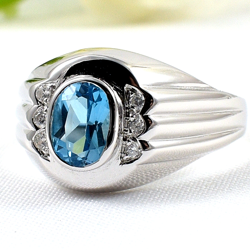 แหวนเงินแท้ราคาถูกชุบทองคำขาว สวิสบลูโทปาซแท้ 0.95 กะรัต เพชรCZ 0.06 กะรัต งานประณีตสวยงาม สั่งผลิตค่ะ