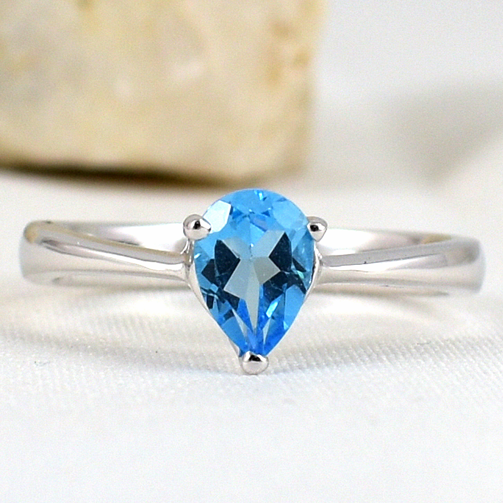 แหวนเงินแท้ราคาถูกชุบทองคำขาว สวิสบลูโทปาซแท้ 0.80 กะรัต งานประณีตสวยงาม สั่งผลิตค่ะ