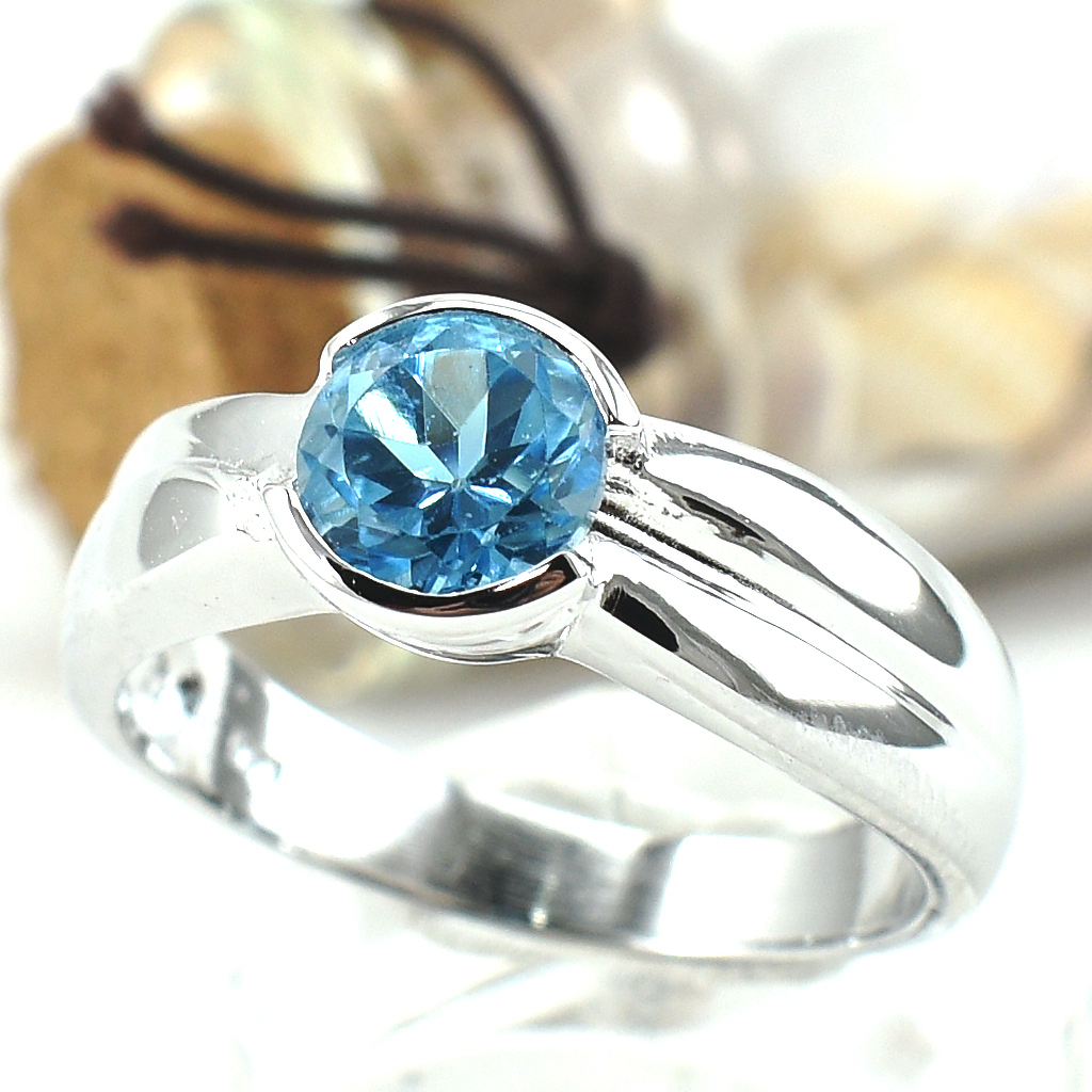 แหวนเงินแท้ราคาถูกชุบทองคำขาว สวิสบลูโทปาซแท้ 1.35 กะรัต งานประณีตสวยงาม สั่งผลิตค่ะ