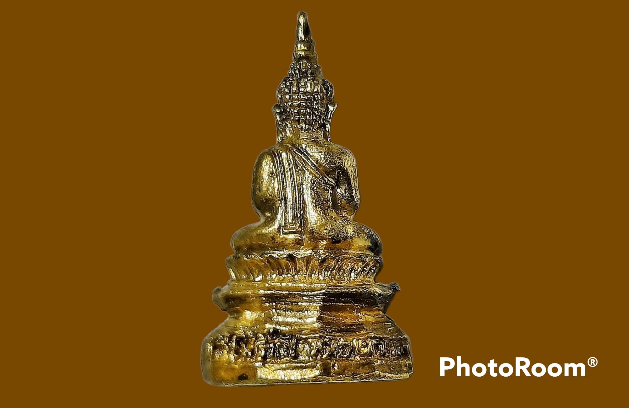 รูปเหมือนหล่อ หลวงพ่อพระใส วัดโพธิ์ชัย จ.หนองคาย ปี 2539 เนื้อกะหลั่ยทอง ขนาด 1.4 x 2.5 cm.