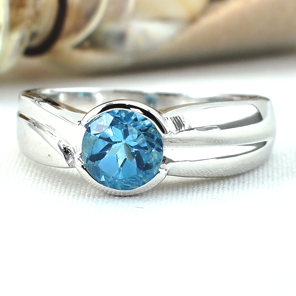 แหวนเงินแท้ราคาถูกชุบทองคำขาว สวิสบลูโทปาซแท้ 1.35 กะรัต งานประณีตสวยงาม สั่งผลิตค่ะ