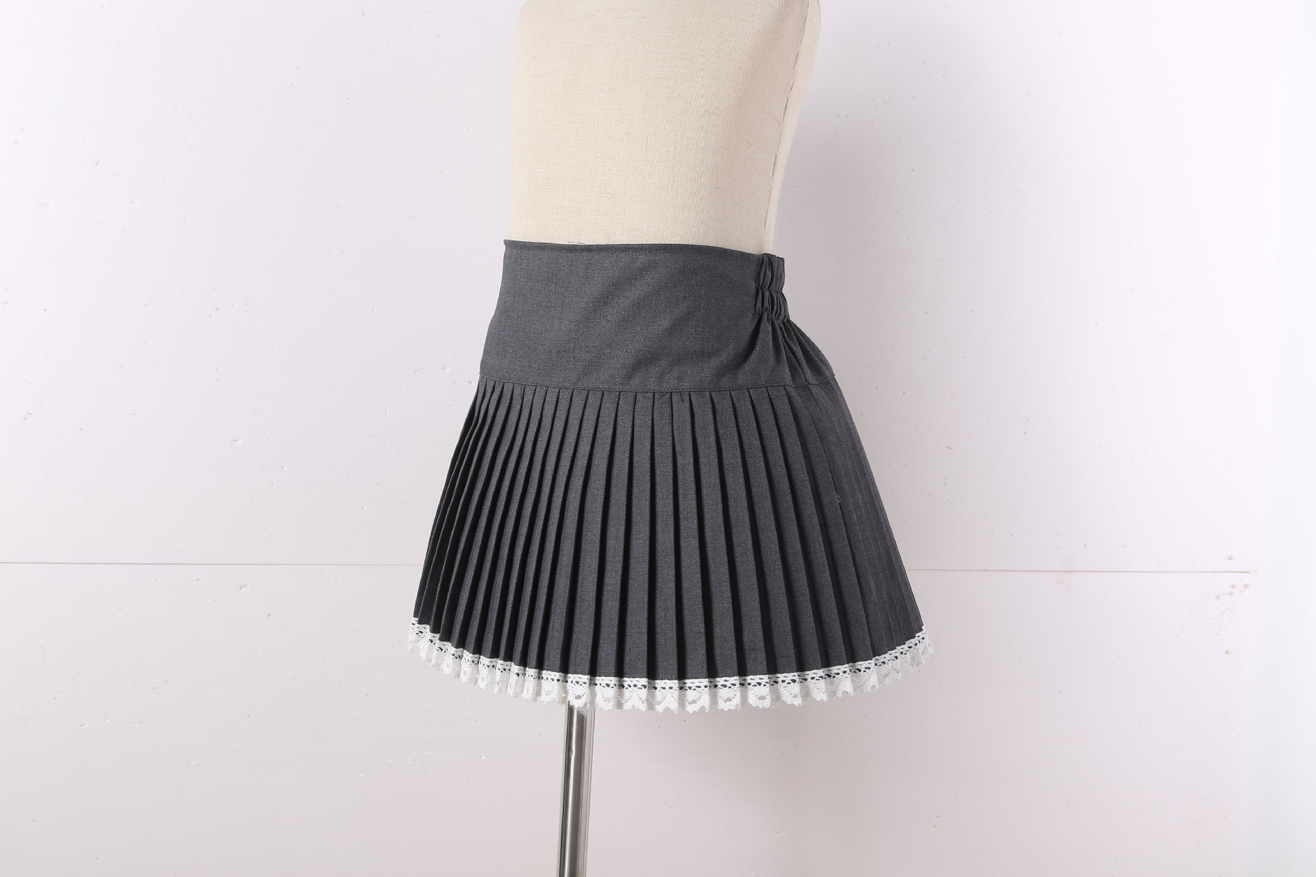 กระโปรง เด็กผู้หญิง อัดพลีส สีพื้นแยกสร้อม**พร้อมแบบโบว์ชมพู