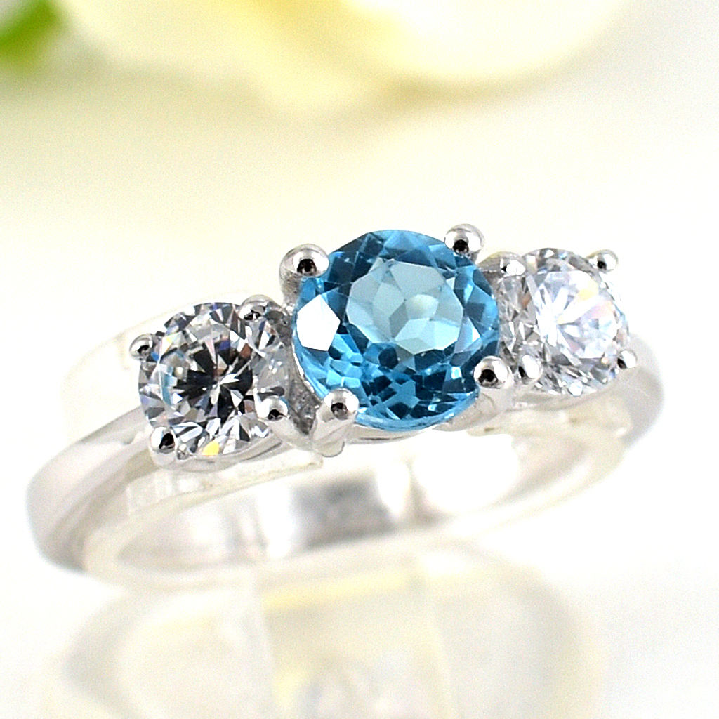 แหวนเงินแท้ราคาถูกชุบทองคำขาว สวิสบลูโทปาซแท้ 0.76 กะรัต เพชรCZ 0.50 กะรัต งานประณีตสวยงาม สั่งผลิตค่ะ