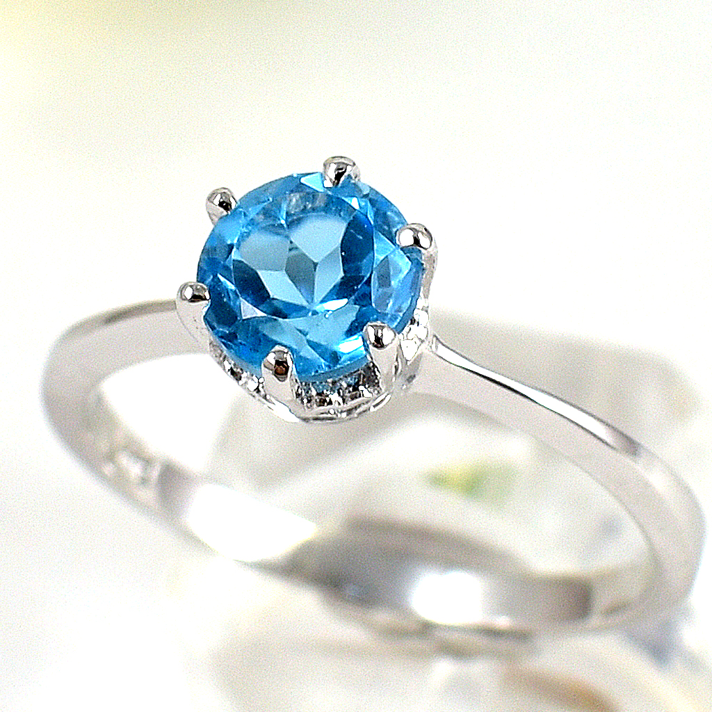 แหวนเงินแท้ราคาถูกชุบทองคำขาว สวิสบลูโทปาซแท้ 1.25 กะรัต งานประณีตสวยงาม สั่งผลิตค่ะ