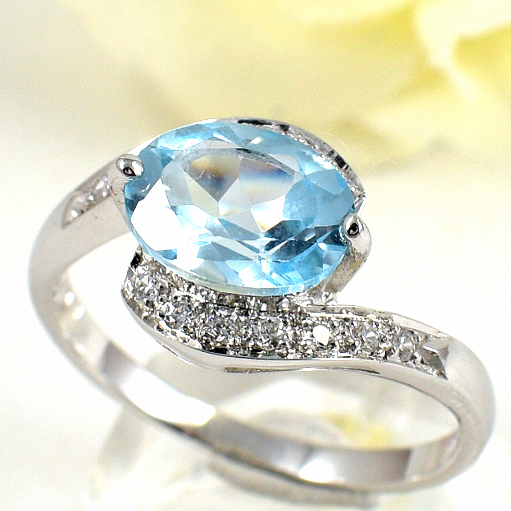 แหวนเงินแท้ราคาถูกชุบทองคำขาว สกายบลูโทปาซแท้ 2.29 กะรัต เพชรCZ 0.14 กะรัต งานประณีตสวยงาม สั่งผลิตค่ะ