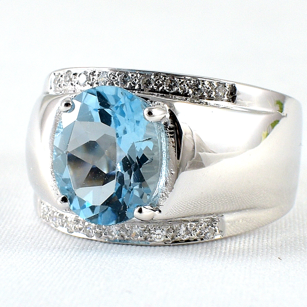 แหวนเงินแท้ราคาถูกชุบทองคำขาว สกายบลูโทปาซแท้ 4.50 กะรัต เพชรCZ 0.18 กะรัต งานประณีตสวยงาม สั่งผลิตค่ะ