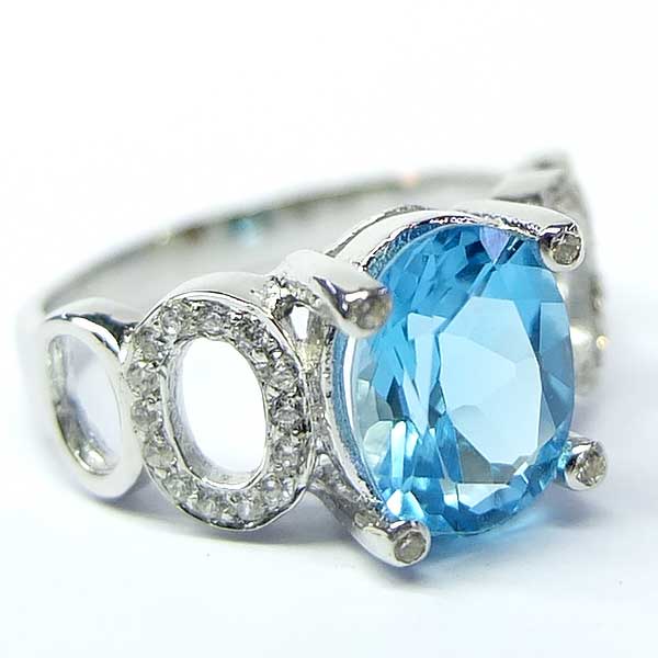 แหวนเงินแท้ราคาถูกชุบทองคำขาว สวิสบลูโทปาซแท้ 2.25 กะรัต เพชรCZ 0.224 กะรัต งานประณีตสวยงาม สั่งผลิตค่ะ