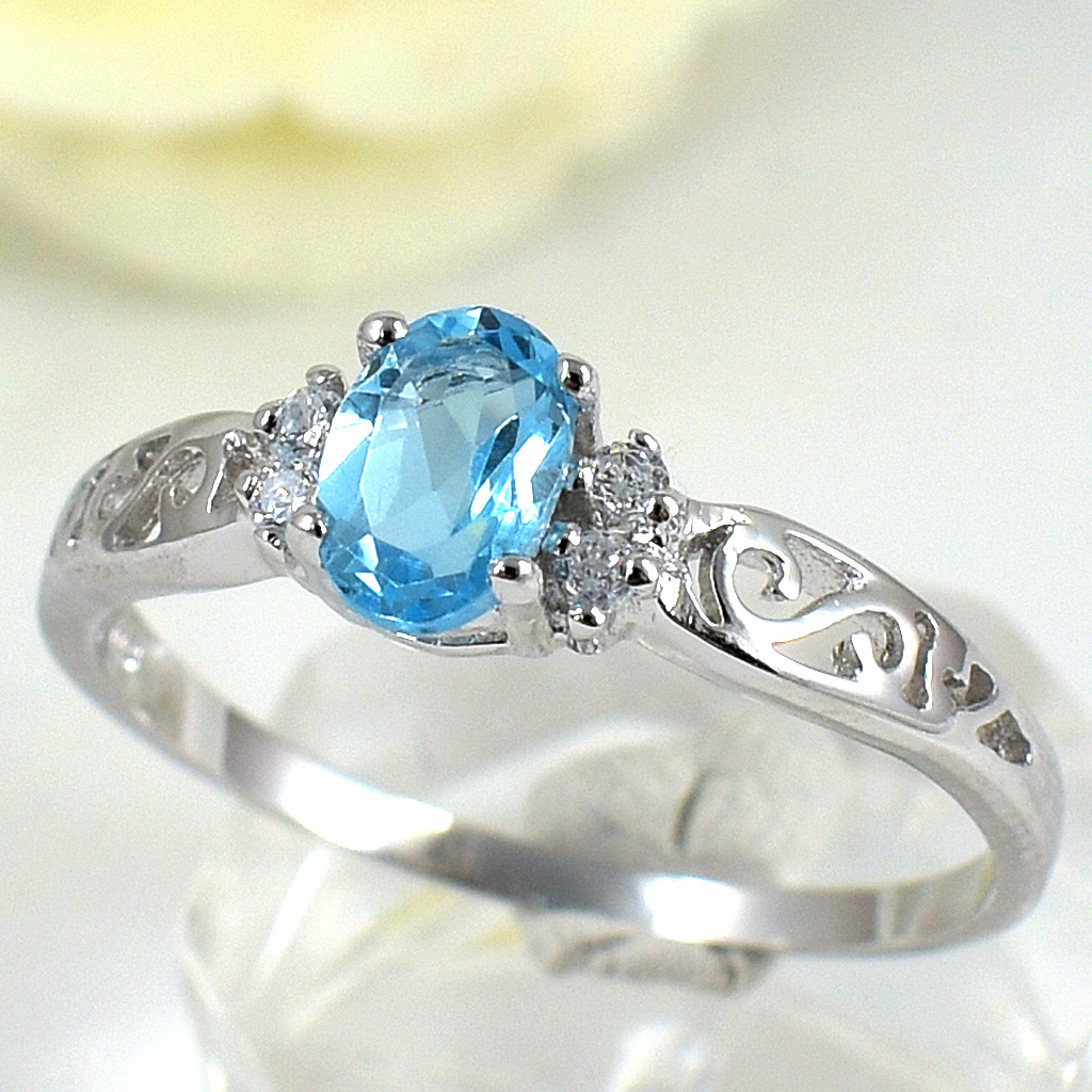 แหวนเงินแท้ราคาถูกชุบทองคำขาว สวิสบลูโทปาซแท้ 0.65 กะรัต เพชรCZ 0.04 กะรัต งานประณีตสวยงาม สั่งผลิตค่ะ