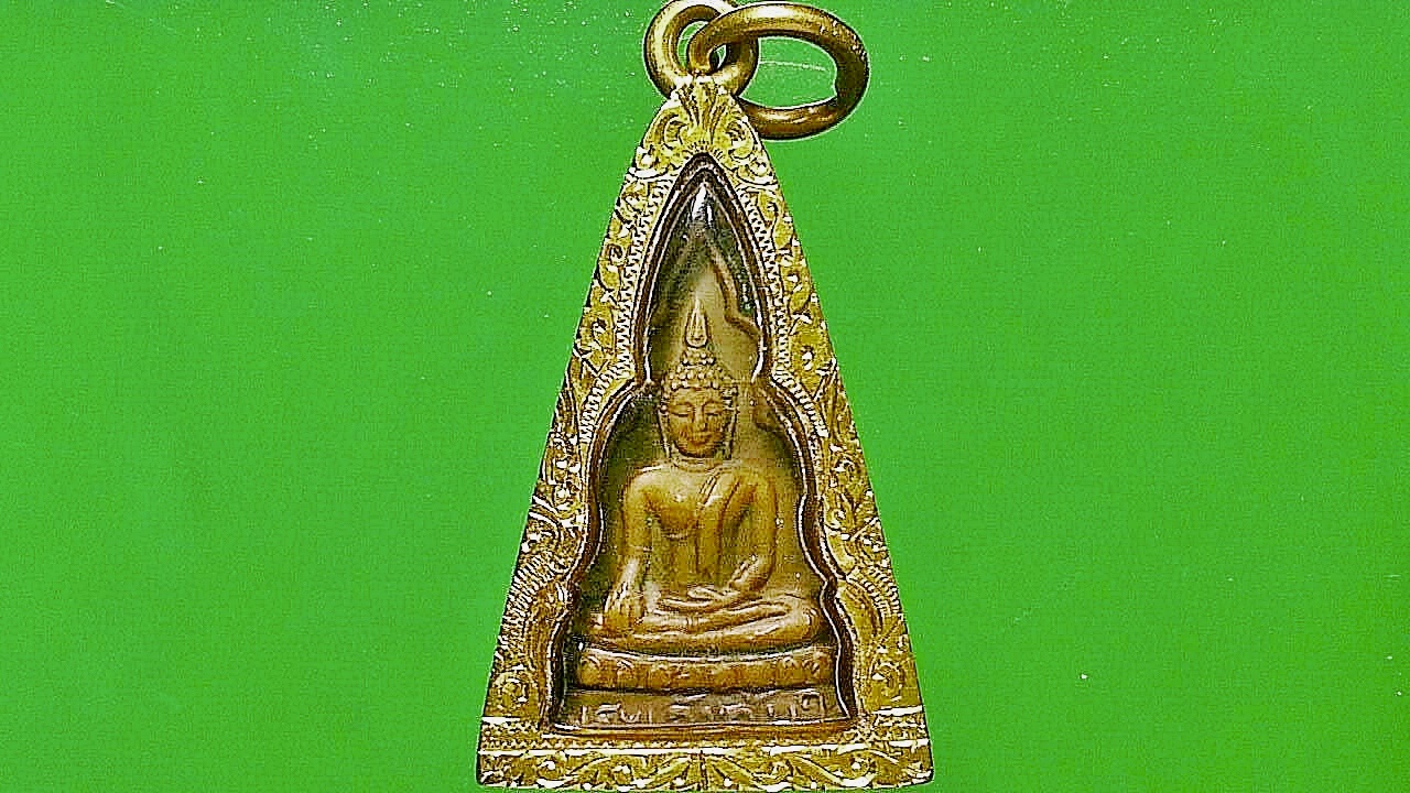 เหรียญพระเจ้าทันใจ วัดพระธาตุปูแจ จ.แพร่ เลี่ยมทองคำปิดหลัง