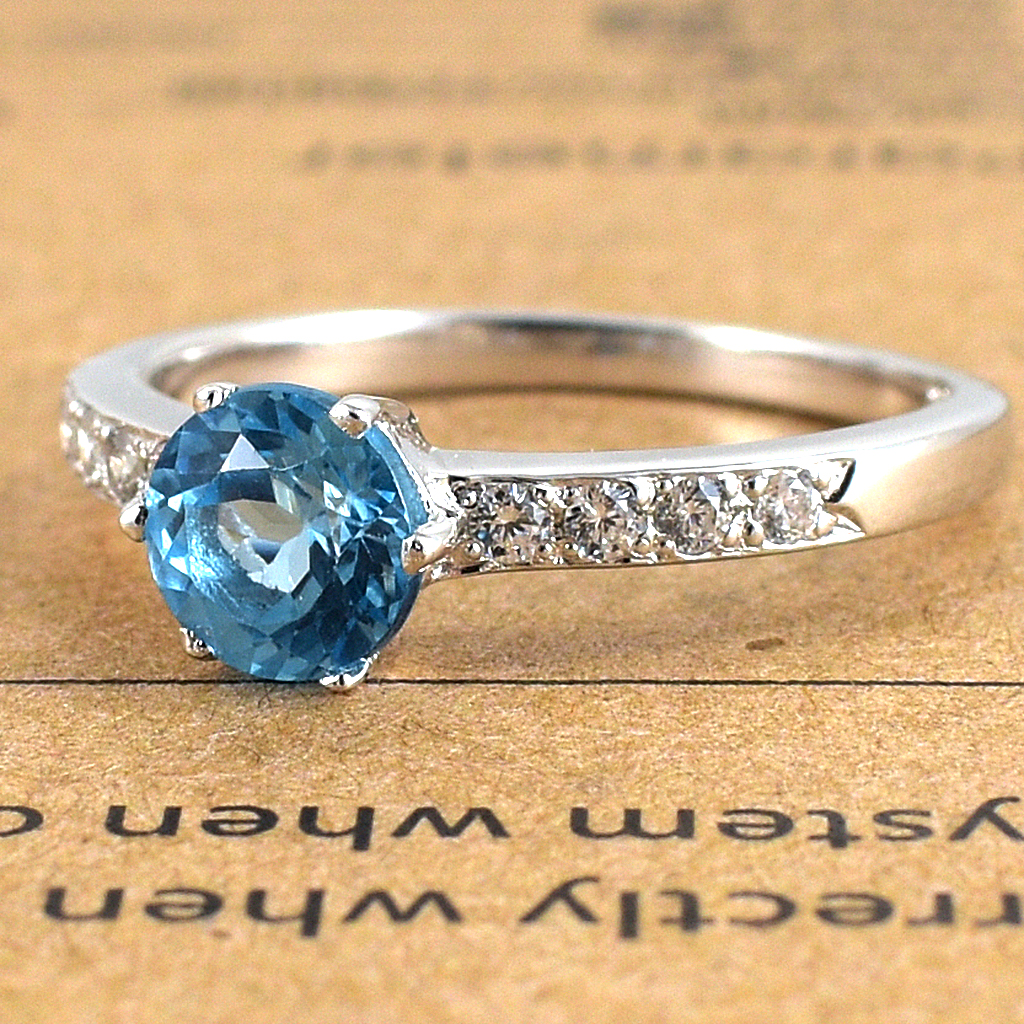 แหวนเงินแท้ราคาถูกชุบทองคำขาว สวิสบลูโทปาซแท้ 0.92 กะรัต เพชรCZ 0.20 กะรัต งานประณีตสวยงาม สั่งผลิตค่ะ