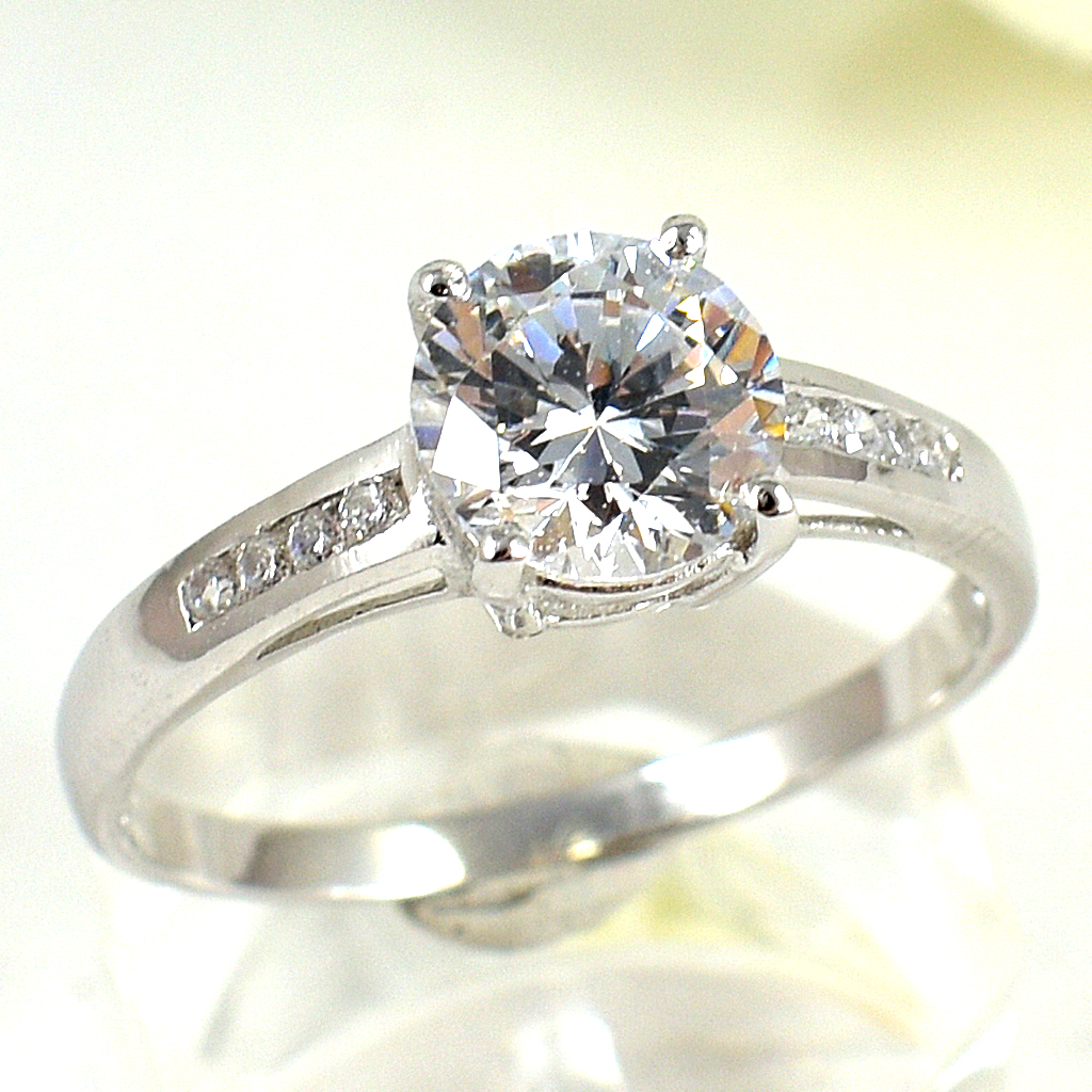 แหวนเงินแท้ราคาถูกชุบทองคำขาว เพชรCZเม็ดกลาง 1.25 กะรัต เพชรCZเม็ดข้าง 0.08 กะรัต งานประณีตสวยงาม สั่งผลิตค่ะ