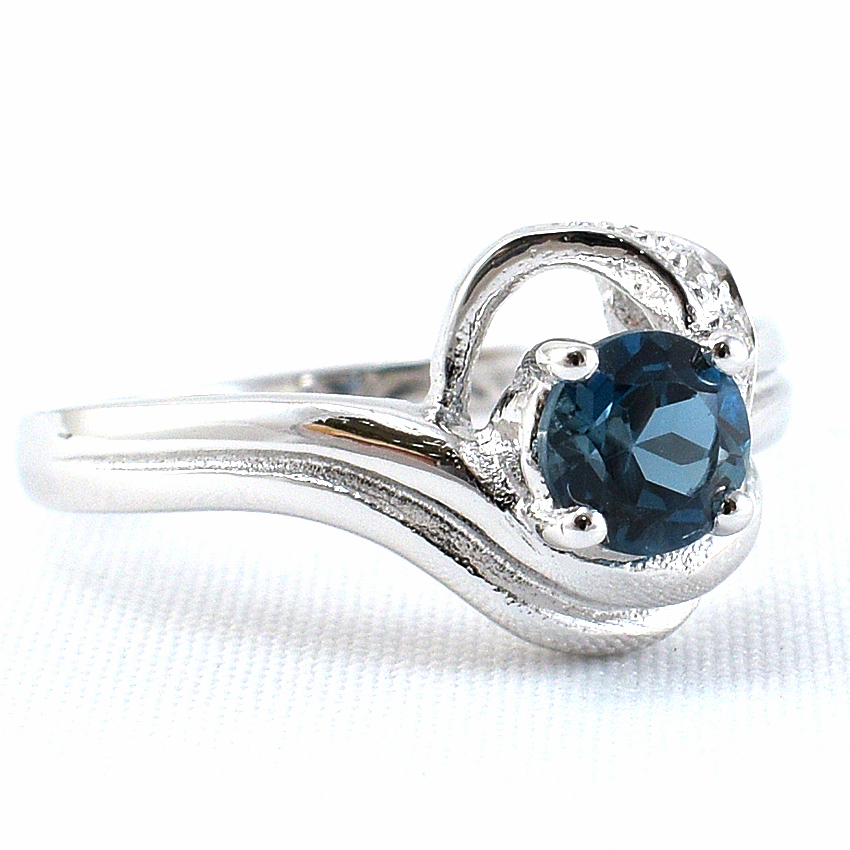 แหวนเงินแท้ราคาถูกชุบทองคำขาว ลอนดอนบลูโทปาซแท้ 0.60 กะรัต เพชรCZ 0.034 กะรัต งานประณีตสวยงาม สั่งผลิตค่ะ