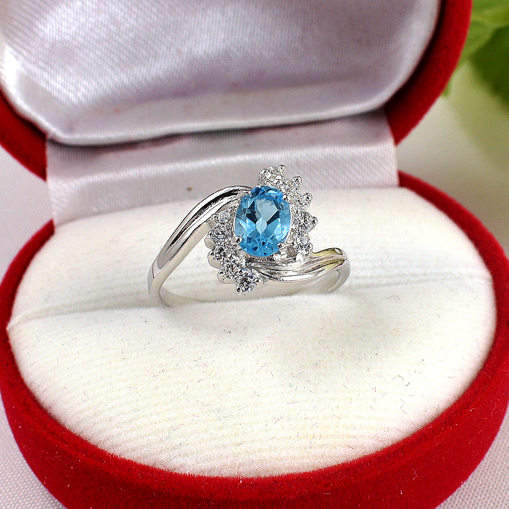 แหวนเงินแท้ราคาถูกชุบทองคำขาว สวิสบลูโทปาซแท้ 1.05 กะรัต เพชรCZ 0.10 กะรัต งานประณีตสวยงาม สั่งผลิตค่ะ