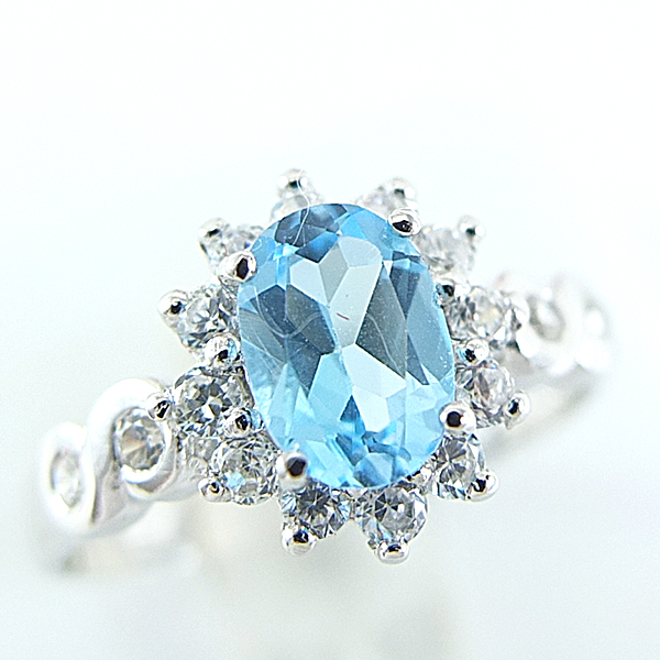 แหวนเงินแท้ราคาถูกชุบทองคำขาว สวิสบลูโทปาซแท้ 0.95 กะรัต เพชรCZ 0.40 กะรัต งานประณีตสวยงาม สั่งผลิตค่ะ