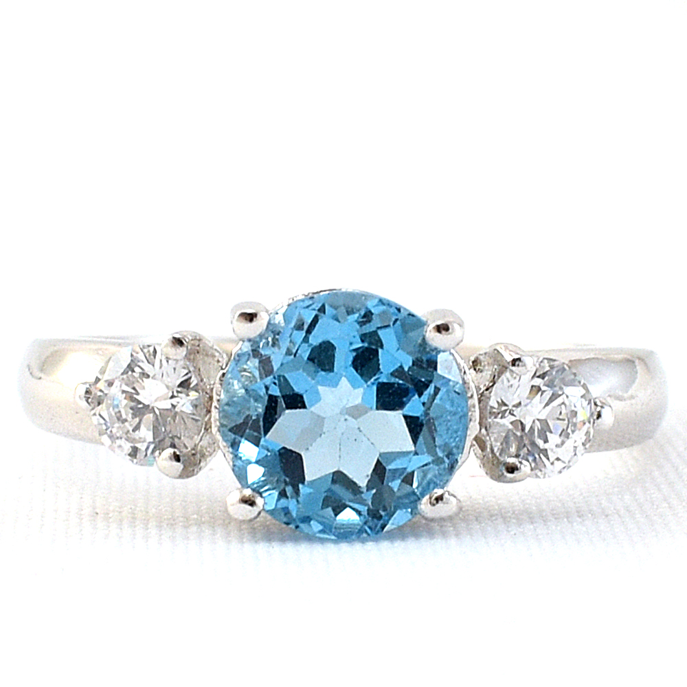 แหวนเงินแท้ราคาถูกชุบทองคำขาว สวิสบลูโทปาซแท้ 1.55 กะรัต เพชรCZ 0.030 กะรัต งานประณีตสวยงาม สั่งผลิตค่ะ