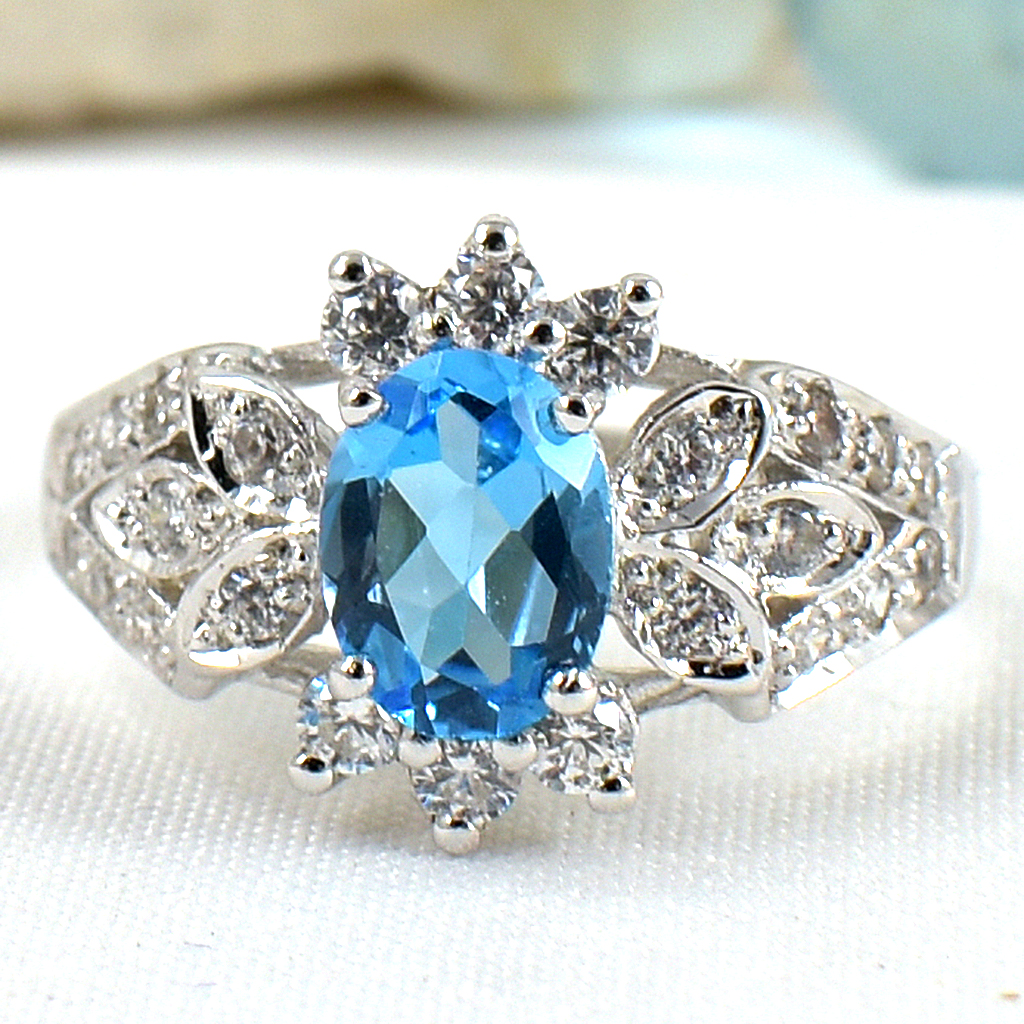 แหวนเงินแท้ราคาถูกชุบทองคำขาว สวิสบลูโทปาซแท้ 1.85 กะรัต เพชรCZ 0.27 กะรัต งานประณีตสวยงาม สั่งผลิตค่ะ