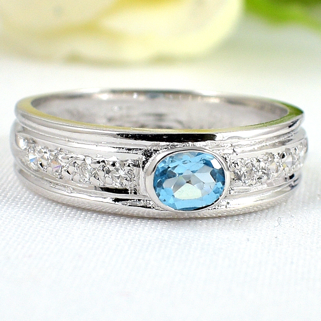 แหวนเงินแท้ราคาถูกชุบทองคำขาว สวิสบลูโทปาซแท้ 0.55 กะรัต เพชรCZ 0.24 กะรัต งานประณีตสวยงาม สั่งผลิตค่ะ