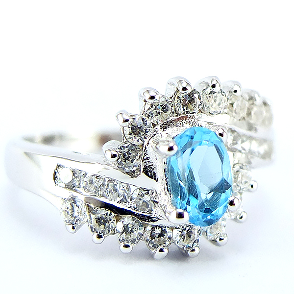 แหวนเงินแท้ราคาถูกชุบทองคำขาว สวิสบลูโทปาซแท้ 0.54 กะรัต เพชรCZ 0.60 กะรัต งานประณีตสวยงาม สั่งผลิตค่ะ